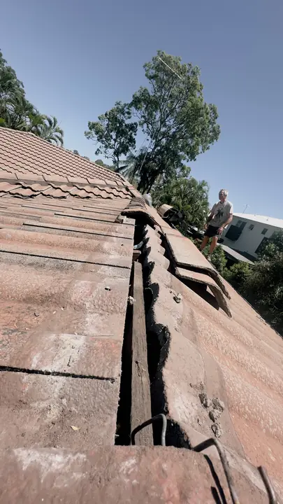 Roof inspection underway, tracing water entry before any hazardous material is disturbed.